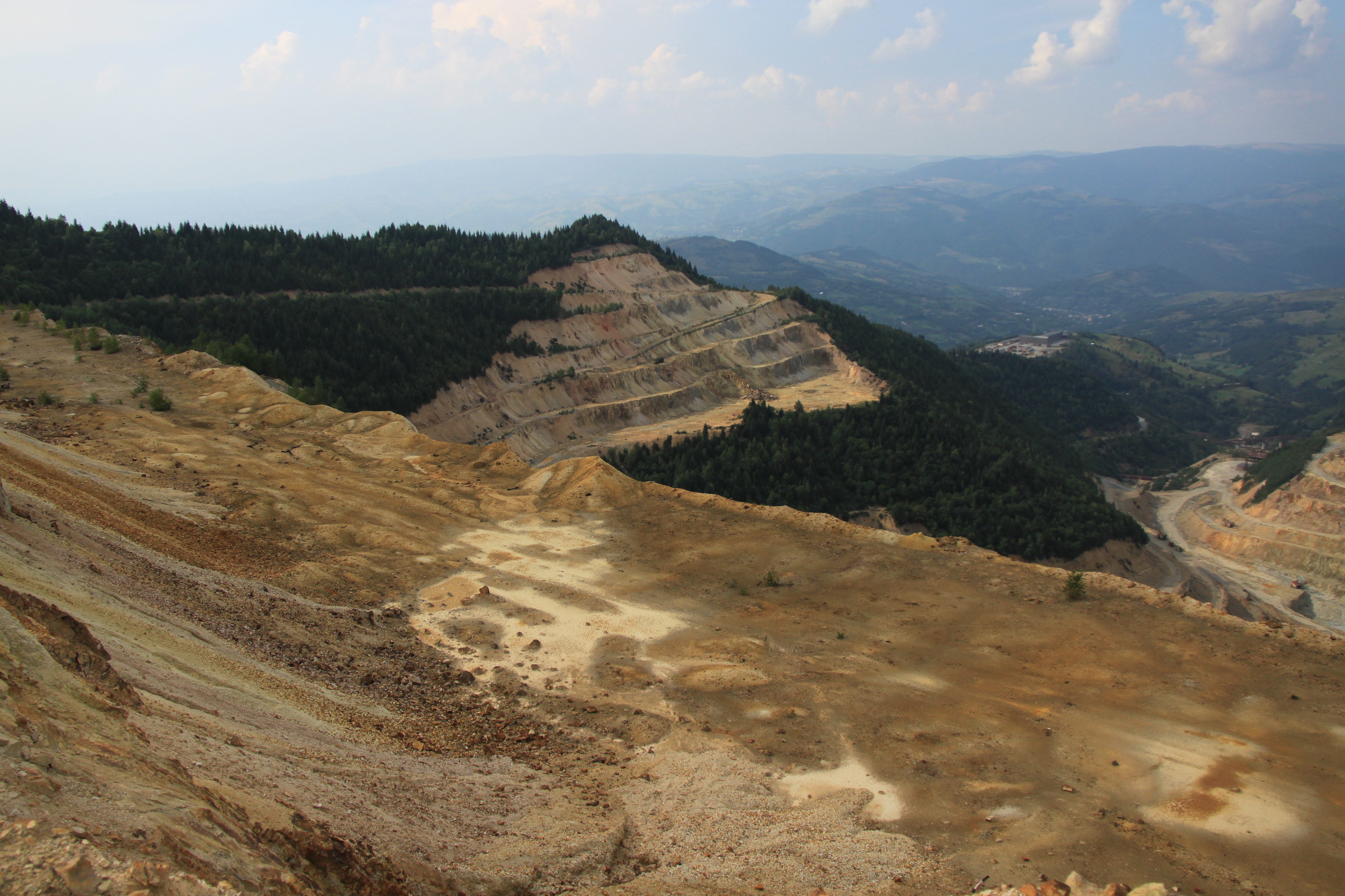 Image of an open mine at Roşia Montană, Romania
